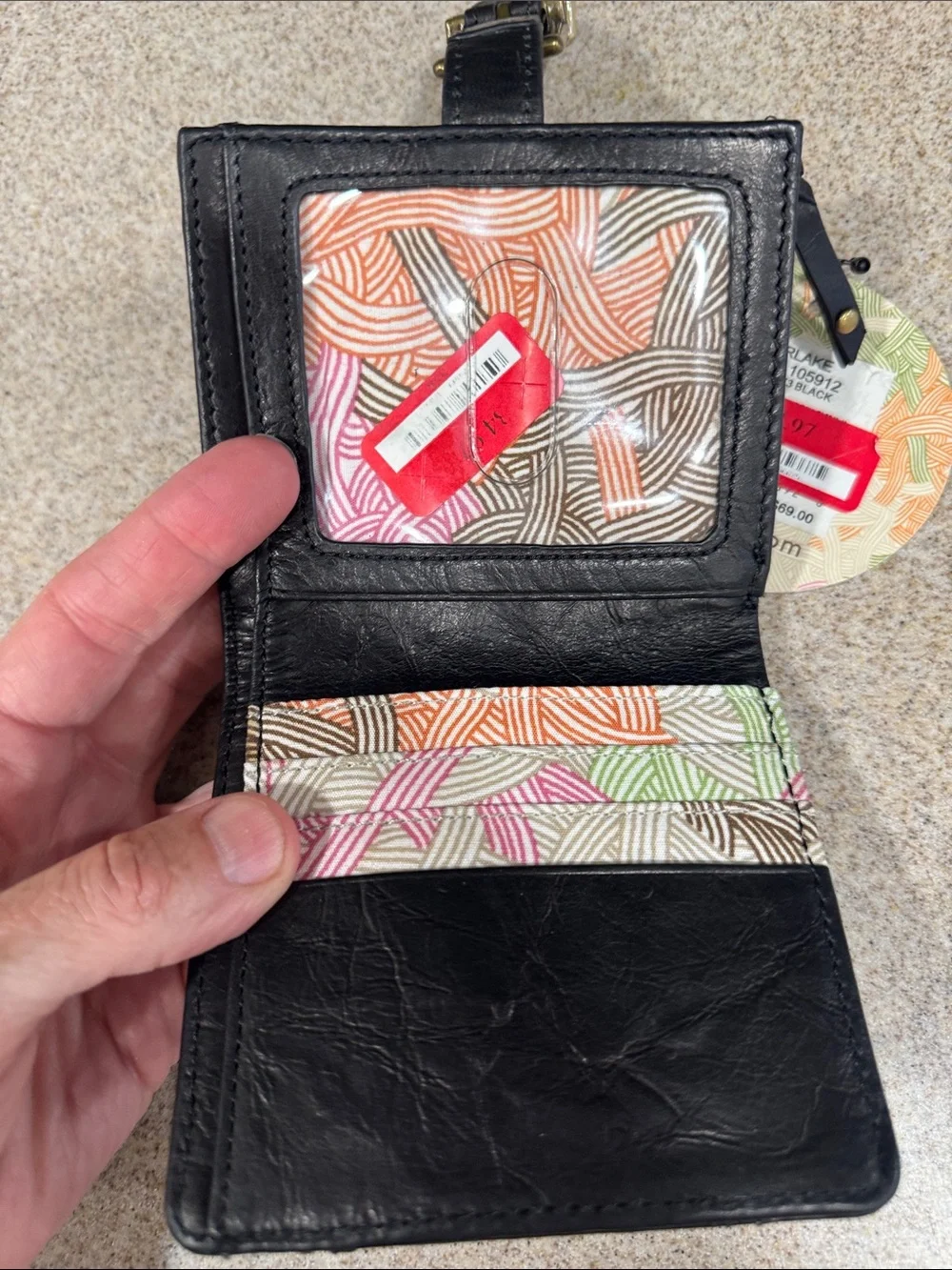 The Sak Black Leather Wristlet with Snap Accent